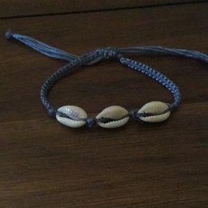 Adjustable cowrie shell bracelet
